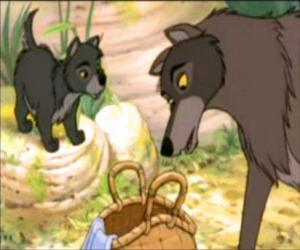 Puzzle Le loup  Raksha trouve perdu dans la forêt à un bébé, Mowgli