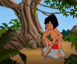 Puzzle Mowgli assis sur un rocher de pensée