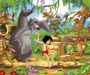 Puzzle Mowgli danse avec son ami, l'ours Balooo