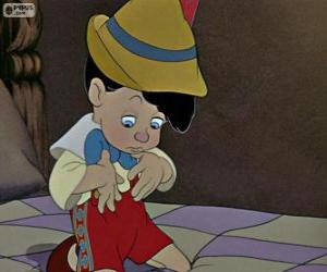 Puzzle Pinocchio surpris de voir qu'il ya un vrai petit garçon