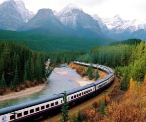 Puzzle Aux trains de passagers dans un paysage montagneux