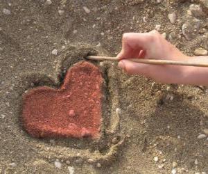 Puzzle Coeur tracée dans le sable