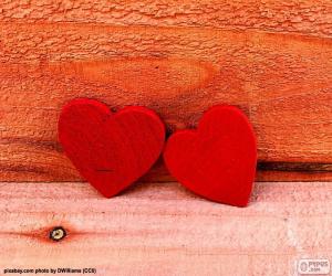 Puzzle Coeurs en bois rouge