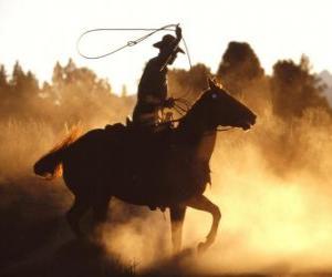 Puzzle Cowboy en montant un cheval avec le lasso