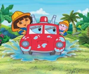 Puzzle Dora the Explorer fille à côté du singe Babouche, avec une pompe à incendie