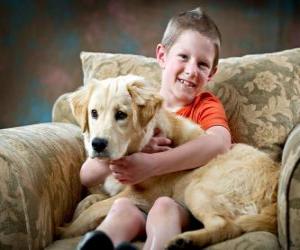 Puzzle Enfant avec son chien