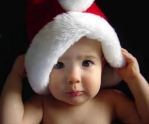 Puzzle Enfant avec un chapeau de Père Noël