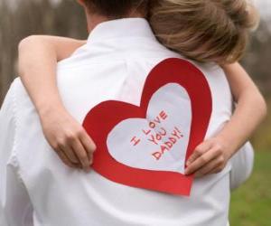 Puzzle Fille à féliciter son père avec une étreinte et un coeur de papier