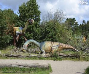 Puzzle Groupe de trois dinosaures dans le paysage