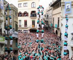 Puzzle Historique construction humaine, 'castell', tour de deux persones pour huit étages, soulevé et déchargées par Castellers de Vilafranca le 1 Novembre, 2010