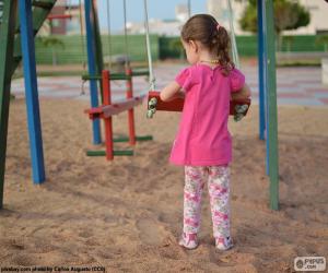 Puzzle Jeune fille sur une balançoire