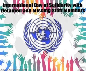 Puzzle Journée internationale de solidarité avec les membres du personnel détenus ou portés disparus