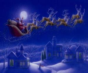 Puzzle Le Père Noël dans son traîneau magique tiré par des rennes volants sur le nuit de Noël 