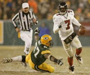 Puzzle Michael Vick courrant avec le ballon en main