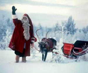 Puzzle Père Noël agitant avec son traîneau