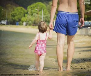 Puzzle Père et fille sur la plage