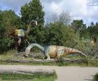 Groupe de trois dinosaures dans le paysage