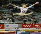 Gymnastique artistique - Exercice dans le poutre