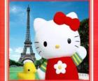 Hello Kitty avec un birdie et de la Tour Eiffel en arrière-plan