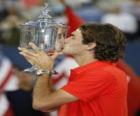 Roger Federer avec un trophées