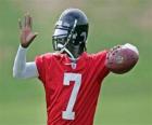 Michael Vick en l'action, prêt à tenter une passe