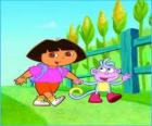 Dora, la fille exploratrice, à côté du singe Babouche explorant