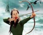 Susan Pevensie prête à lancer une flèche avec l'arc