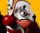 Détail du visage d'un clown au nez rouge