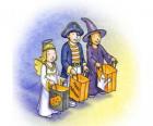 Trois enfants vêtus de truc ou un traiter - Un fantôme, une sorcière et un démon avec des sacs
