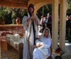 Marie, Joseph et l'enfant Jésus dans la crèche vivante