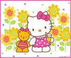 Hello Kitty avec une boisson à la campagne avec son ours en peluche Tiny Chum