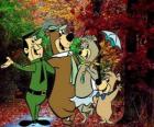 Les protagonistes de l'aventure: Yogi l'ours, Boo-Boo, Cindy et le gardes-parc Smith