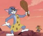 Tom habillé en homme des cavernes avec un club pour écraser Jerry