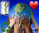 Jour de la Terre, le 22 avril. Un hereux monde, un monde du recyclage et avec amour pour l'environnement