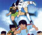 Les joueurs de football dans un match de Captain Tsubasa