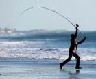 Pêcheur sur la plage