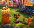 Le Lorax jouant avec des animaux de la vallée de Trufula