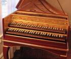 Un clavecin est un instrument de musique à cordes muni d'un ou plusieursnote claviers