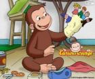 Le curieux singe George fait des marionnettes