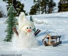 Bonhomme de neige et traîneau