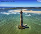 Morris Island Lighthouse le matin ensoleillé, Caroline du Sud, États-Unis Le phare a été inscrit au Registre national des lieux historiques en 1982