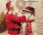 Le Père Noël et un bonhomme de neige
