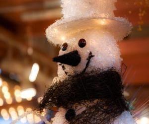 Puzzle Visage bonhomme de neige avec chapeau et un foulard
